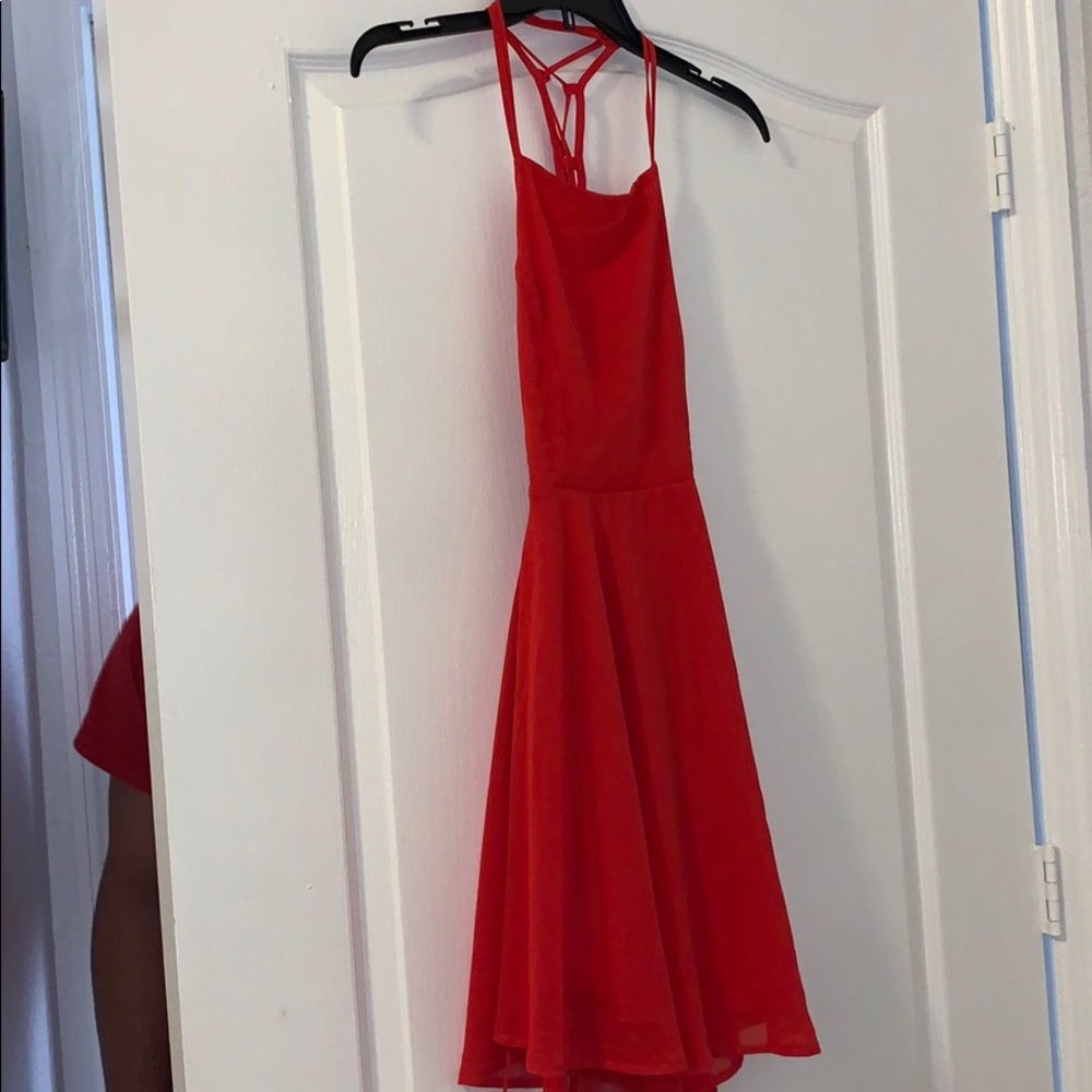 red crossed back lulus dress.